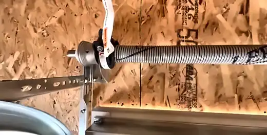 Torsion spring winding cone on a garage door spring